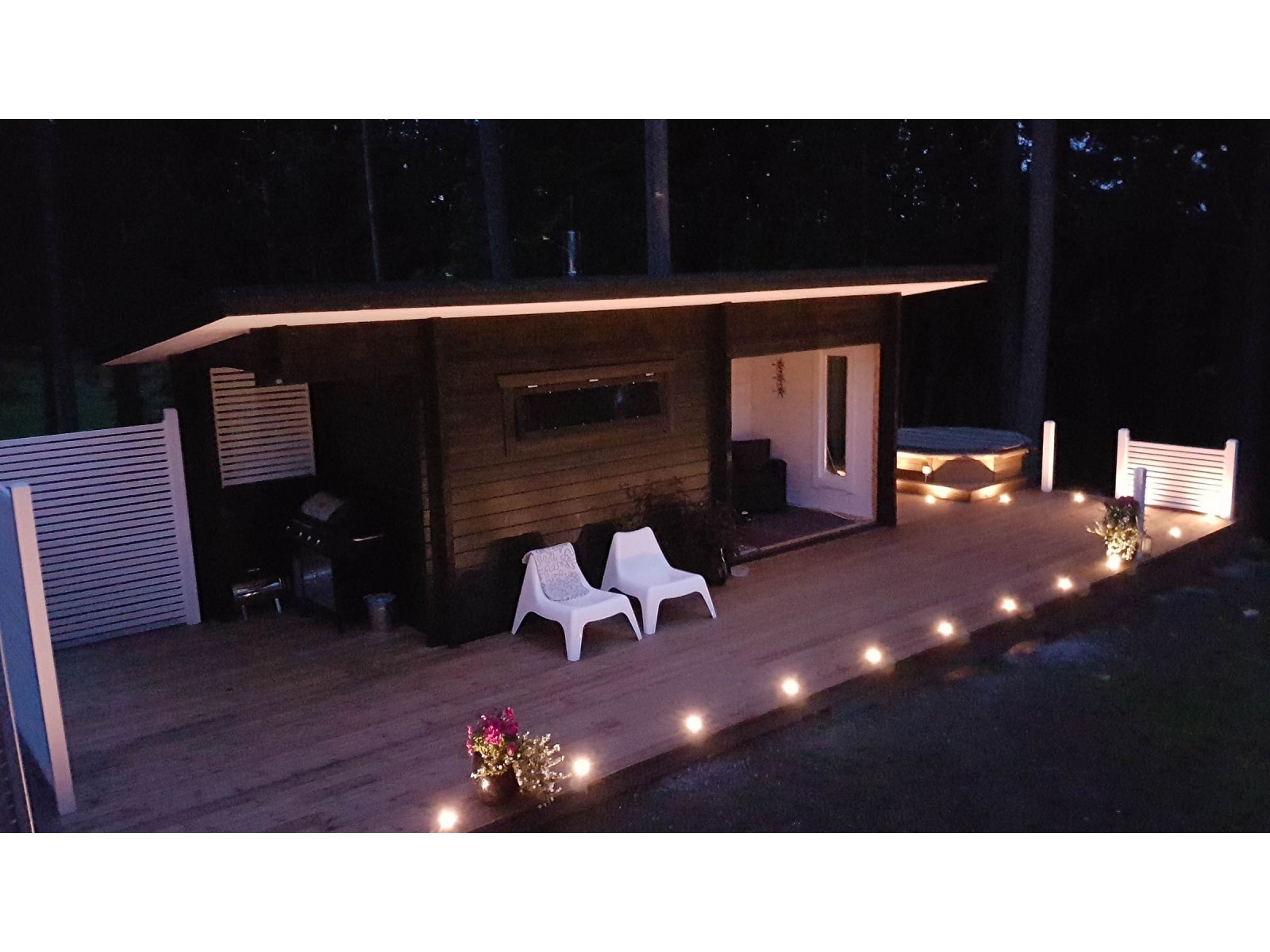 Sauna Pisara - Asiakkaan ottama valokuva iltavalaistuksessa